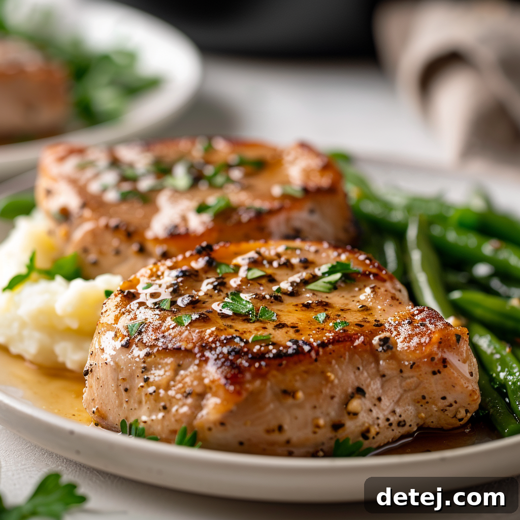 Honey Garlic Pork Chops plated with green beans and rice