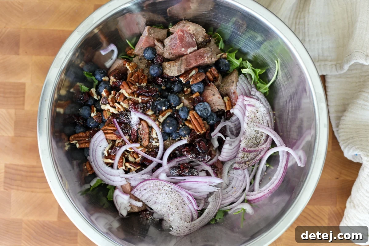 Seared Steak & Blueberry Harvest Salad 6 everything in a bowl.