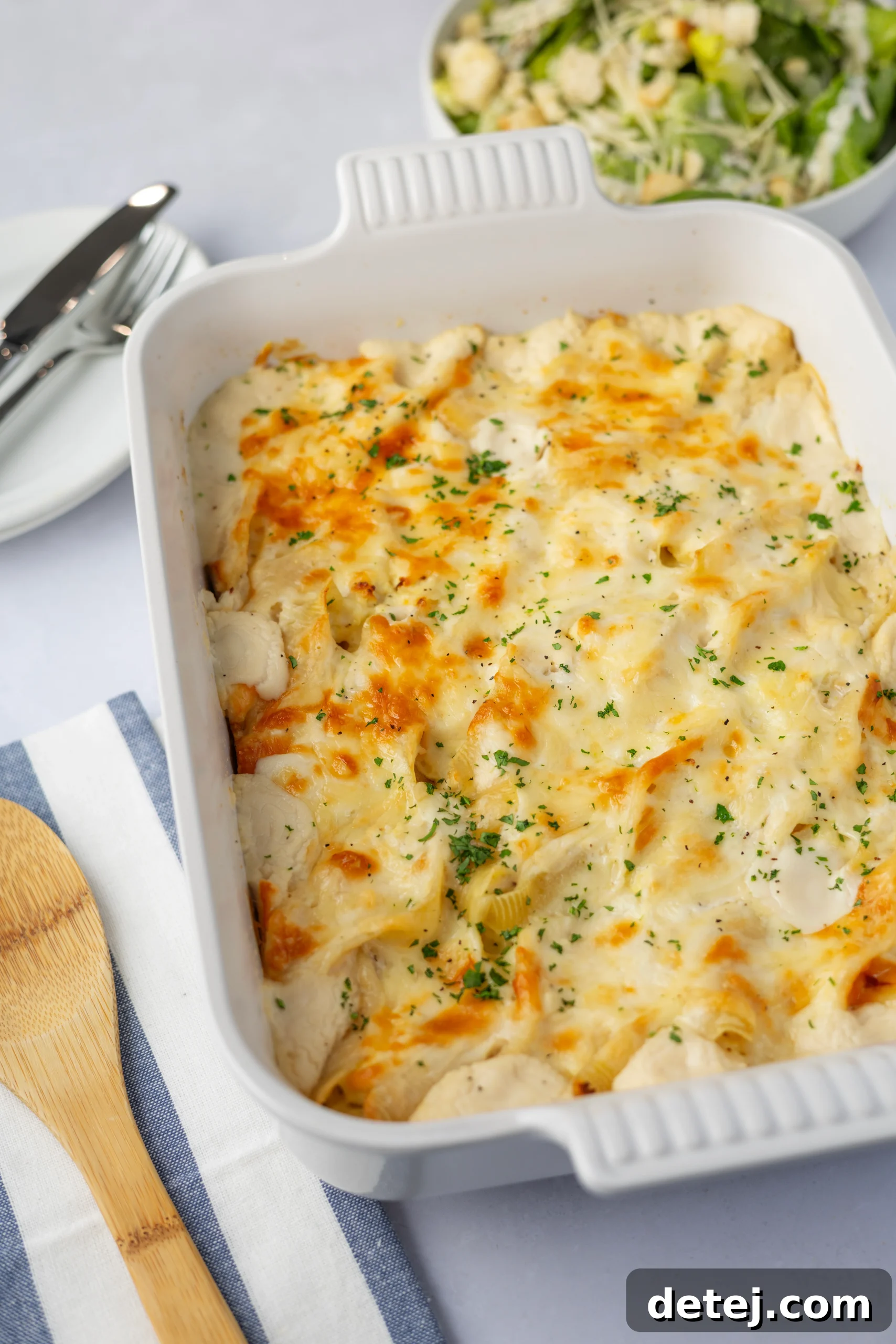 Cheesy Chicken Alfredo Stuffed Shells - A baked pasta dish with a creamy sauce and golden cheese