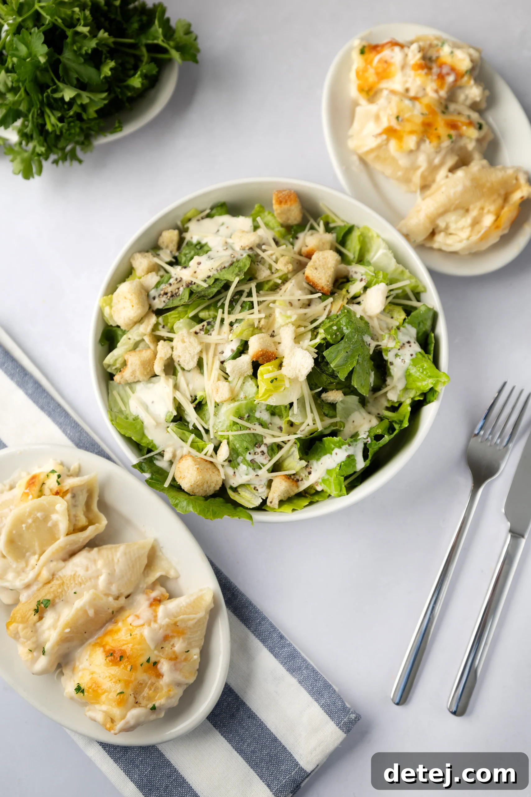 Cheesy Chicken Alfredo Stuffed Shells served with a side salad