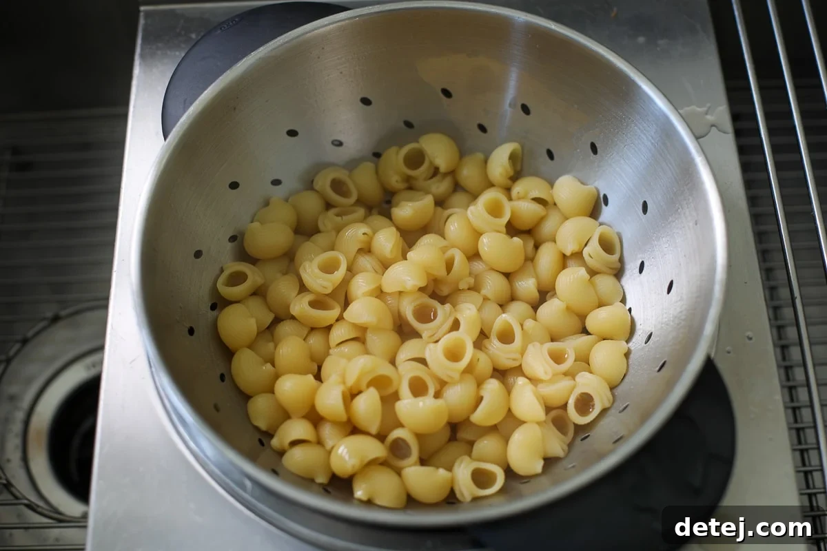 Bone Broth Pasta Recipe with Garlic, Herbs, and Parmesan 5 drained pasta.