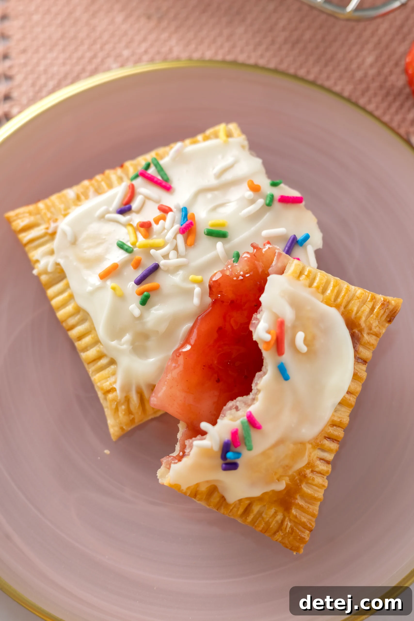How to Make Homemade Strawberry Pop-Tarts 4 Homemade Strawberry Pop-Tarts with glaze and sprinkles
