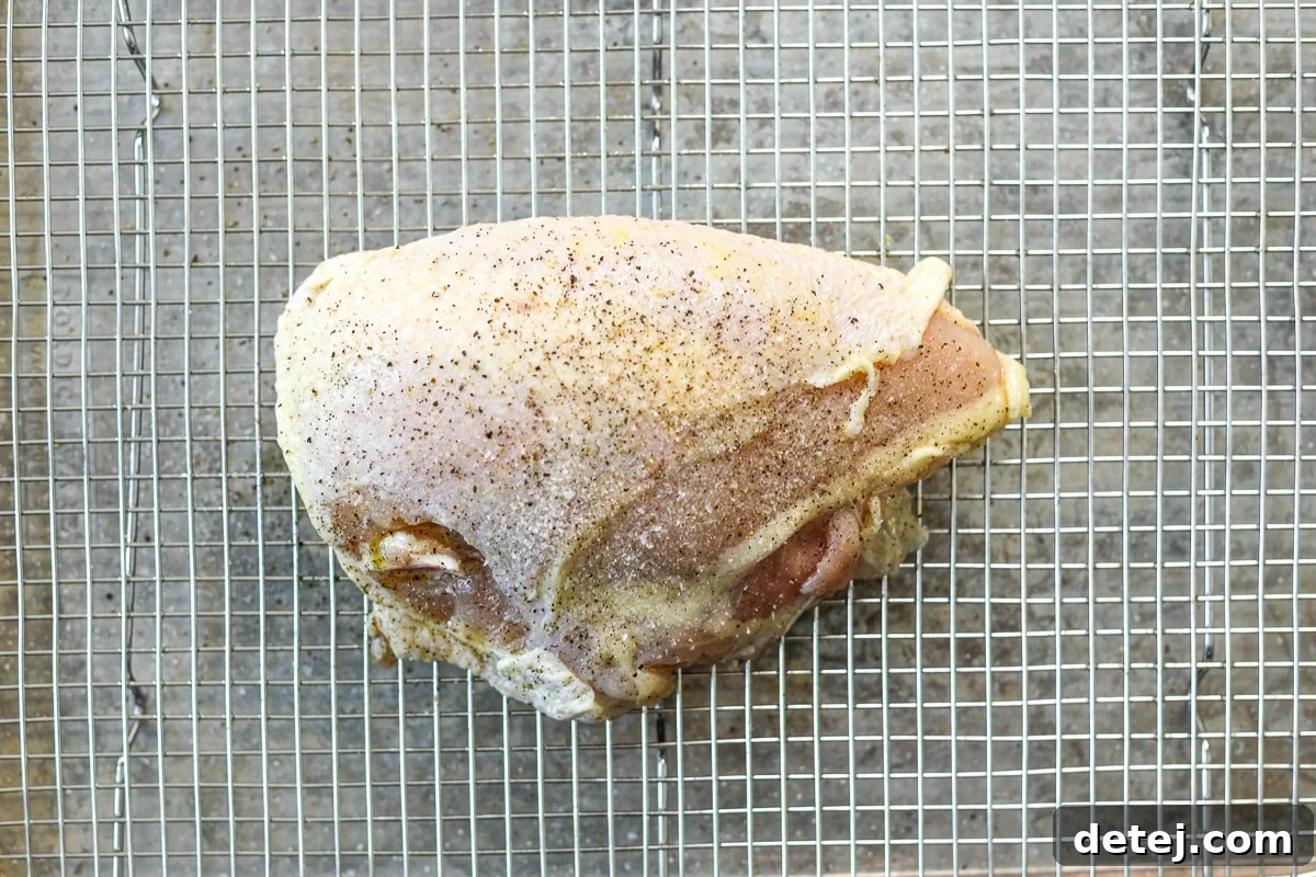 chicken on a baking tray.